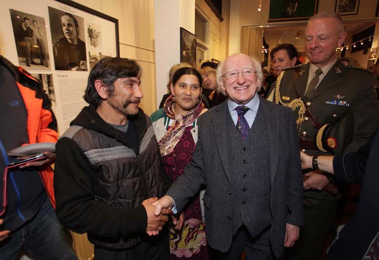 Guest of Honour President of Ireland, Michael D. Higgins and his wife Sabina. Here the President with a Roma couple. ©Photo by Derek Speirs. 